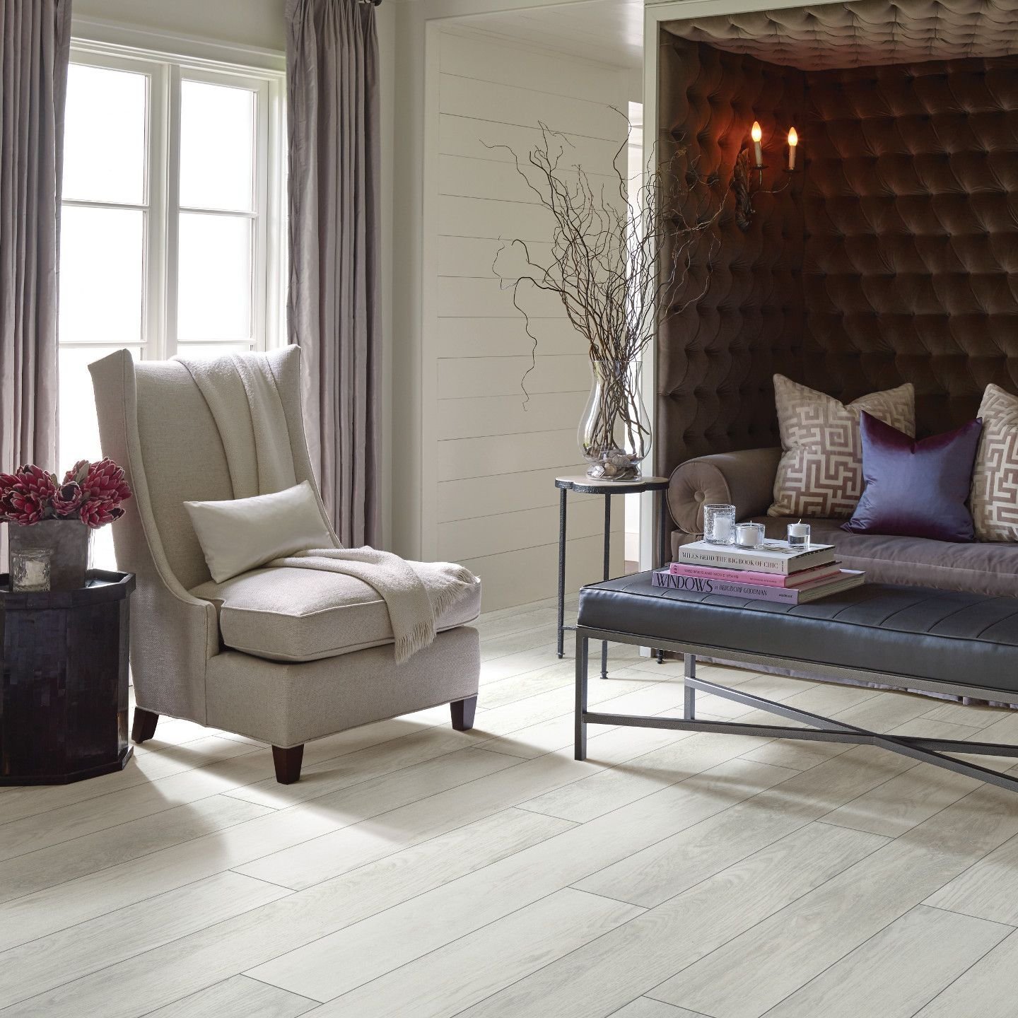 living room with hard flooring and couches - Home Designs of Hastings in Hastings, MN