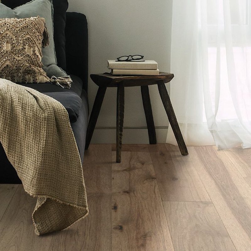 hardwood flooring with small side table - Home Design of Hastings in Hastings, MN